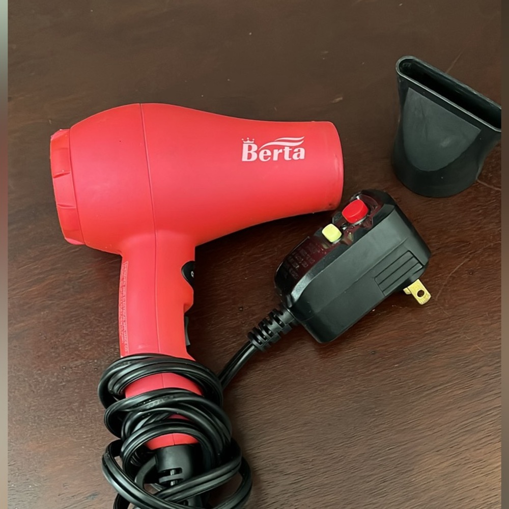 Travel size hair dryer with diffuser.